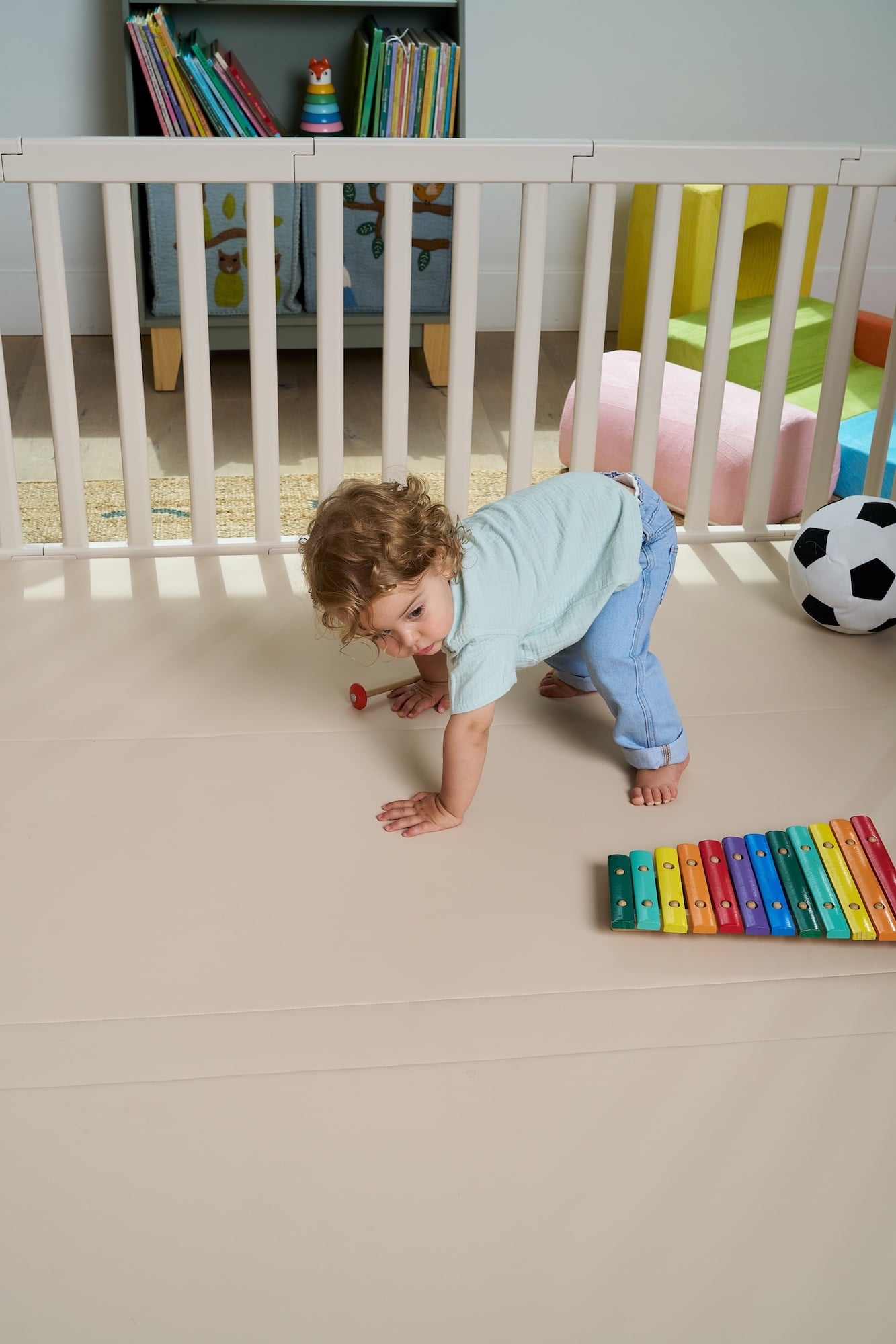 Spacious Matty’s Room baby playpen with child playing on padded mat