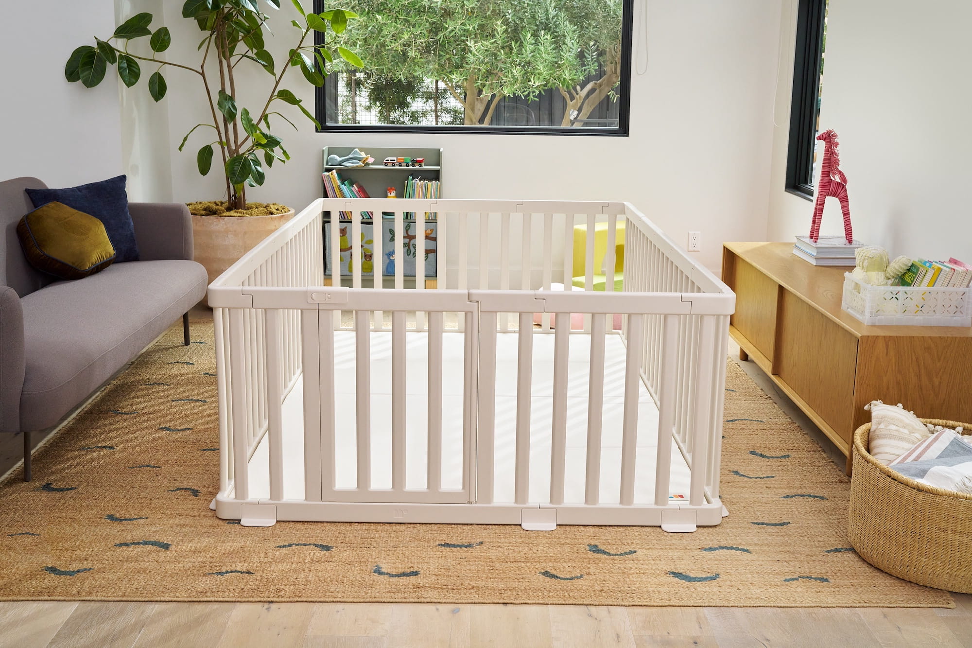 Premium non-toxic playpen and cushioned play mat set styled in a modern home
