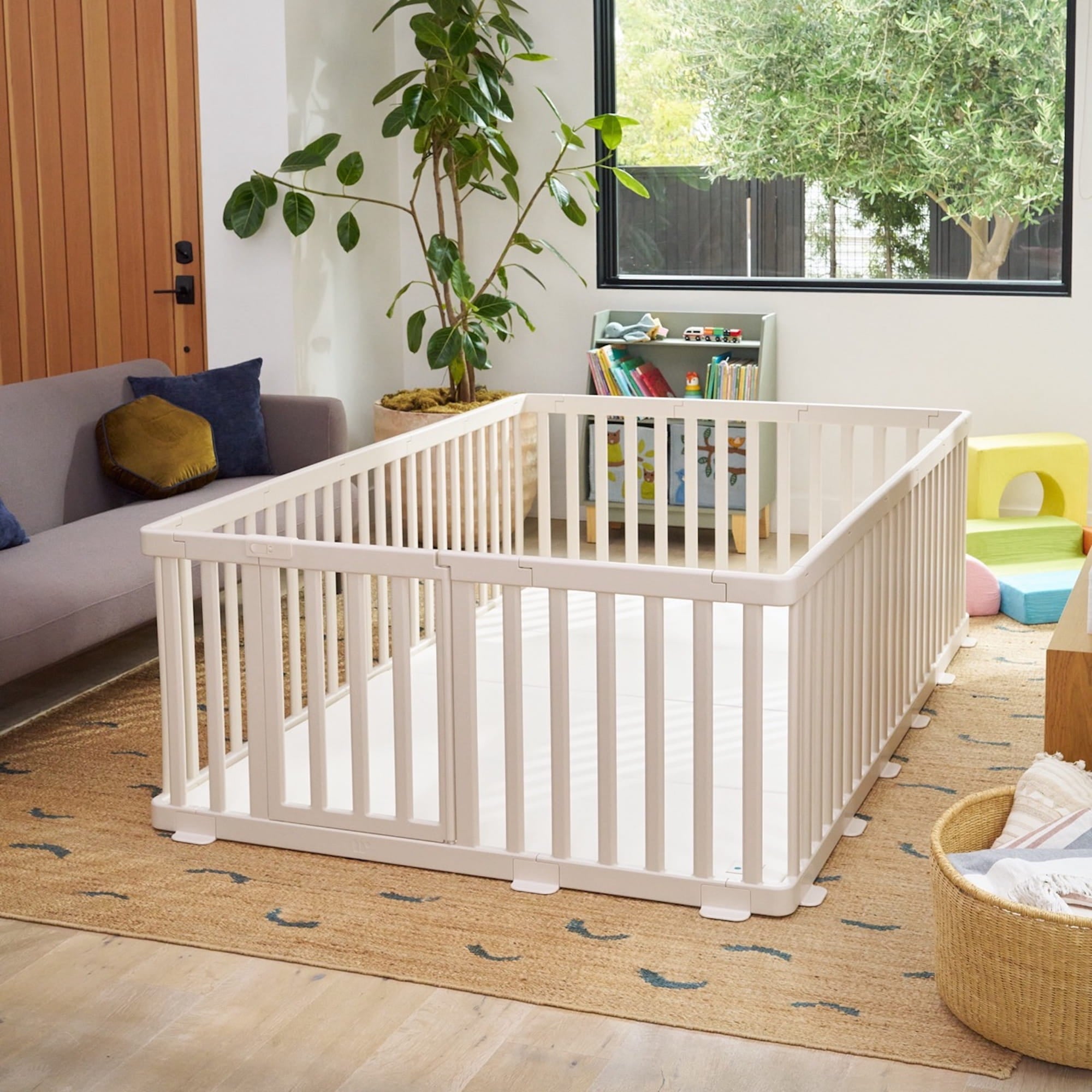 Matty’s Room playpen and cushioned playmat styled together in modern living room
